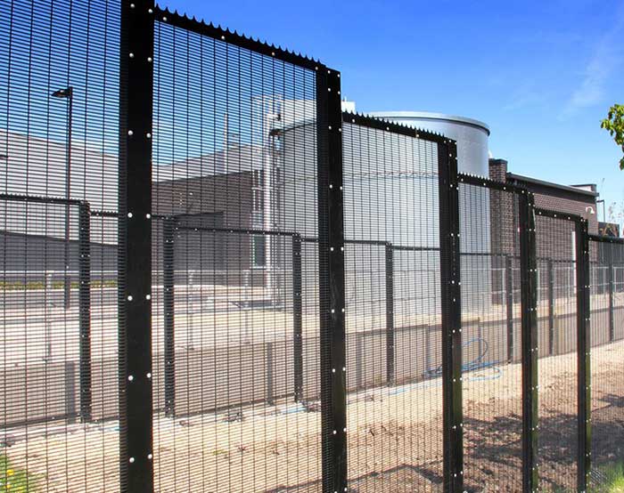 High security fence with spikes