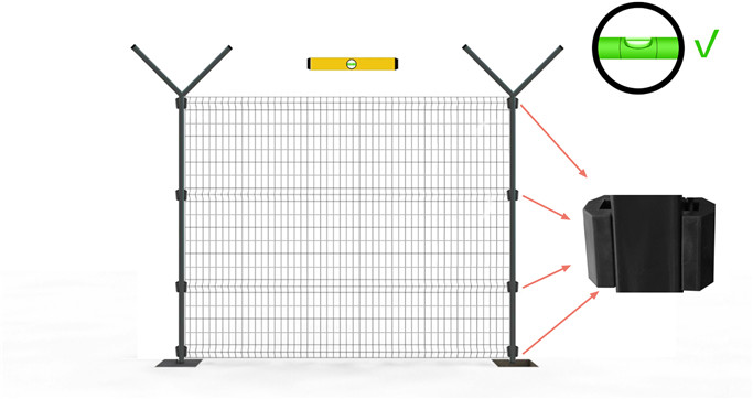 Install the second post with concrete.
Each post must be set perfectly plum in the concrete