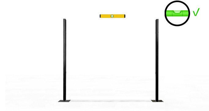 Install the second post with concrete.
Each post must be set perfectly plum in the concrete Install the second post with concrete.
Each post must be set perfectly plum in the concrete